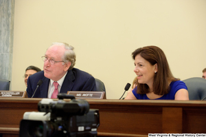 ["Chairman John D. (Jay) Rockefeller and Senator Kelly Ayotte speak at a Commerce Committee hearing."]%