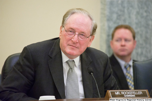 ["Senator John D. (Jay) Rockefeller sits in a Commerce Committee hearing."]%