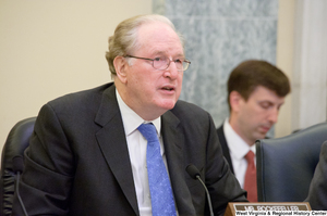 ["Senator John d. (Jay) Rockefeller sits at a Commerce Committee hearing."]%