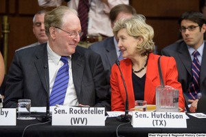 ["Senators John D. (Jay) Rockefeller and Kay Hutchison sit together at an Environment and Public Works Committee hearing."]%