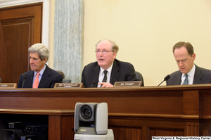 ["Senators John D. (Jay) Rockefeller, John Kerry, and Pat Toomey sit at a Commerce committee hearing."]%