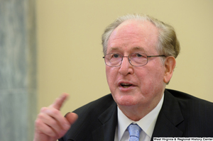 ["Senator John D. (Jay) Rockefeller points a finger during a Commerce Committee hearing."]%