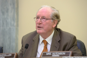 ["Senator John D. (Jay) Rockefeller chairs a Commerce Committee hearing in June 2012."]%