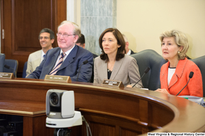 ["Senators John D. (Jay) Rockefeller, Kay Hutchison, and Maria Cantwell listen to testimony at a Commerce Committee hearing."]%