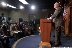 ["Senator John D. (Jay) Rockefeller speaks to a room of reporters at a Senate media event."]%