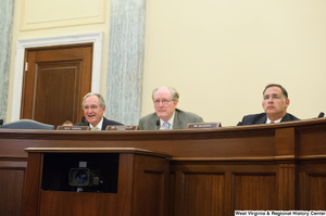 ["Chairman John D. (Jay) Rockefeller sits between Senators Tom Harkin and John Boozman and at a Commerce Committee hearing."]%