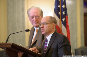 ["Senator John D. (Jay) Rockefeller stands next to a man at a Commerce Committee event about online privacy."]%