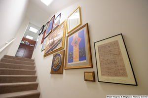 ["Items line the stairwell in Senator John D. (Jay) Rockefeller's office."]%