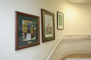 ["Three photos hang in Senator John D. (Jay) Rockefeller's office."]%