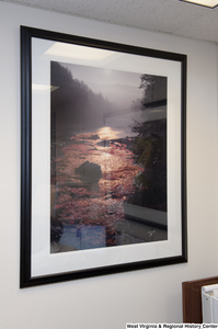 ["A photo of a stream hangs in Senator John D. (Jay) Rockefeller's office."]%