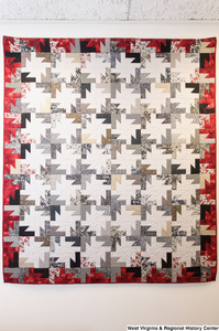 ["A quilt hangs in Senator John D. (Jay) Rockefeller's office."]%