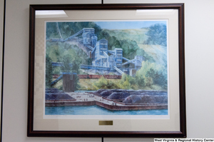 ["A painting of a coal barge on a river hangs in Senator John D. (Jay) Rockefeller's office."]%