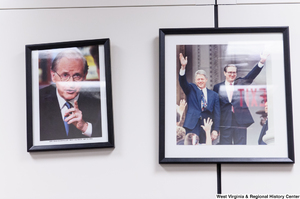 ["Framed photographs hang on the wall in Senator John D. (Jay) Rockefeller's office."]%