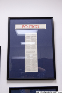 ["A framed Politico article called \"Invest in Technology To Make Coal Clean\" hangs in Senator John D. (Jay) Rockefeller's office."]%