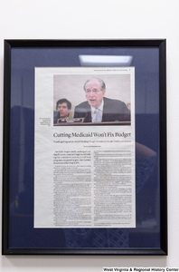 ["A framed article called \"Cutting Medicaid Won't Fix Budget\" hangs in Senator John D. (Jay) Rockefeller's office."]%