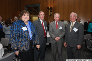 ["Representative Nick Rahall stands with three industry leaders at a Welcome to Washington luncheon."]%