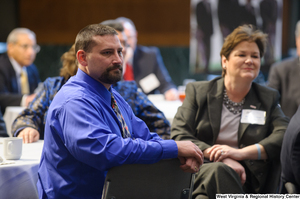 ["Unidentified individuals sit at the Welcome to Washington luncheon."]%