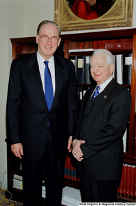 ["Senator John D. (Jay) Rockefeller stands beside Senator Robert C. Byrd after he has been sworn into his fourth term in office."]%
