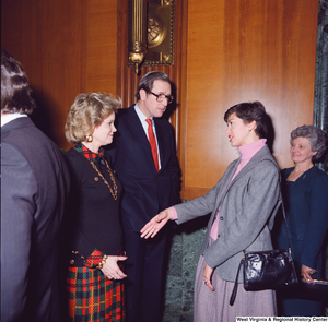 ["Sharon Rockefeller and her husband Senator John D. (Jay) Rockefeller greet an unidentified supporter at the Senate Swearing-In Ceremony."]%