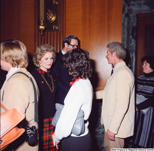["Senator John D. (Jay) Rockefeller and his wife Sharon greet four unidentified supporters after the Senate Swearing-In Ceremony."]%