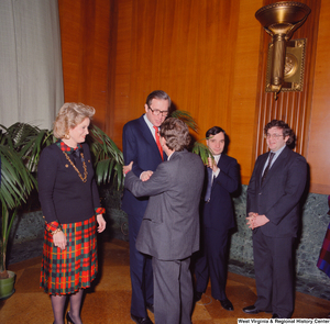 ["Senator John D. (Jay) Rockefeller shakes hands with an unidentified supporter after the Senate Swearing-In Ceremony."]%