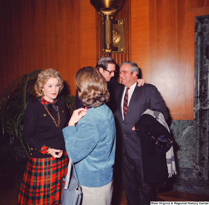 ["Senator John D. (Jay) Rockefeller and Sharon Rockefeller greet supporters at the Senate Swearing-In Ceremony."]%