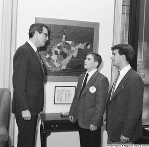 ["Senator John D. (Jay) Rockefeller speaks with two participants in the Presidential Classroom for Young Americans."]%