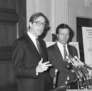 ["Senator H. John Heinz III stands beside Senator John D. (Jay) Rockefeller as he speaks about the Dislocated Workers Improvement Act of 1987 at a press event."]%