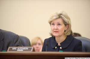 ["Senator Kay Hutchison sits at a Commerce Committee hearing titled \"Safeguarding Our Future: Building a Nationwide Network for First Responders.\""]%