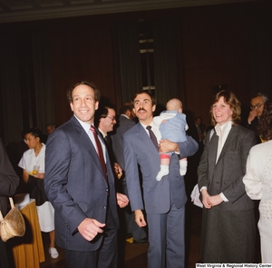 ["Senator John D. (Jay) Rockefeller's staff members stand with Congressman Bob Wise during an event in the Senate."]%