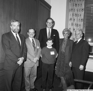 ["Senator John D. (Jay) Rockefeller stands with participants of the NACo Legislative Conference."]%