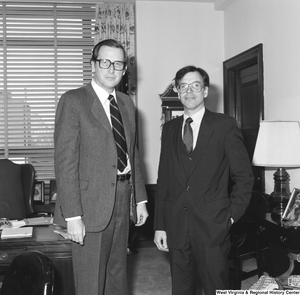 ["An unknown visitor is photographed with Senator John D. (Jay) Rockefeller in his Washington office."]%