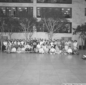 ["Senator John D. (Jay) Rockefeller stands with a student group in the Hart Office Building."]%