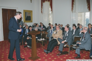 ["Senator John D. (Jay) Rockefeller walks towards his podium before speaking to a group."]%