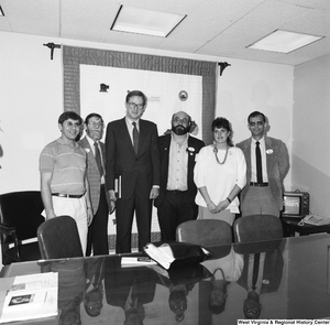 ["Senator John D. (Jay) Rockefeller stands with representatives from the American Federation of State, County and Municipal Employees in his office."]%