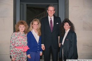 ["Senator John D. (Jay) Rockefeller stands with three students who are participating in the Close Up program."]%