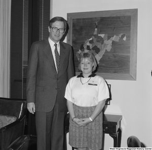 ["Senator John D. (Jay) Rockefeller stands next to a participant in the Washington Workshops."]%