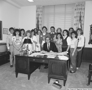 ["Senator John D. (Jay) Rockefeller sits for a picture with an unidentified student group in his Washington office."]%
