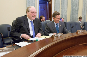 ["Senators John D. (Jay) Rockefeller and Jim DeMint laugh before a Commerce Committee hearing."]%