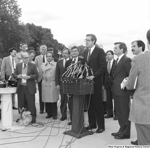 ["Senator John D. (Jay) Rockefeller speaking at an alternative motor fuels event outside the Senate."]%