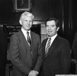 ["West Virginia University President Neil S. Bucklew and Congressman Nick Rahall stand for a photograph at a WVU Alumni Association event in Washington."]%