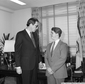 ["Senator John D. (Jay) Rockefeller speaks with an unidentified student in his Washington office."]%