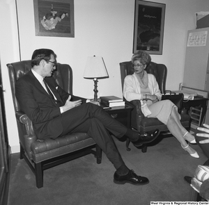["Senator John D. (Jay) Rockefeller sits and speaks with a representative of the Seafarers Union in his office."]%