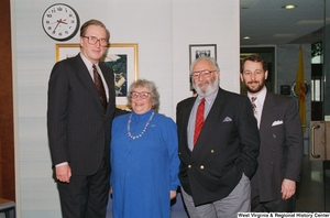 ["Senator John D. (Jay) Rockefeller stands next to three visitors."]%