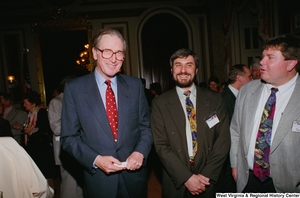 ["Senator John D. (Jay) Rockefeller stands for a photo with two healthcare professionals during a Celebrating Telemedicine conference."]%