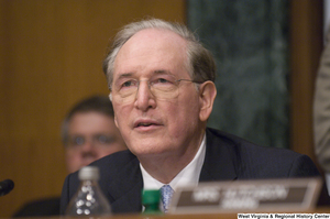 ["Senator John D. (Jay) Rockefeller listens to testimony at a Commerce Committee hearing."]%