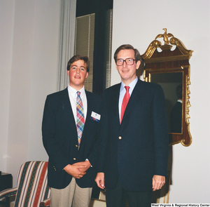 ["This color photograph shows a Washington Workshops participant standing next to Senator John D. (Jay) Rockefeller. This program provides experience-based civic learning opportunities to high achieving students."]%