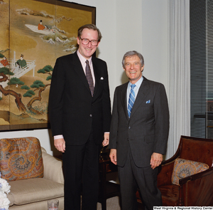 ["Senator John D. (Jay) Rockefeller stands next to the Secretary of Commerce, Robert A. Mosbacher."]%