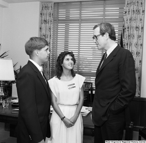 ["Senator John D. (Jay) Rockefeller speaks with two participants of Youths for Understanding, a non-profit educational organization that facilitates international exchange programs for students."]%