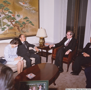 ["Senator John D. (Jay) Rockefeller sits with a representative from the Japanese Embassy."]%